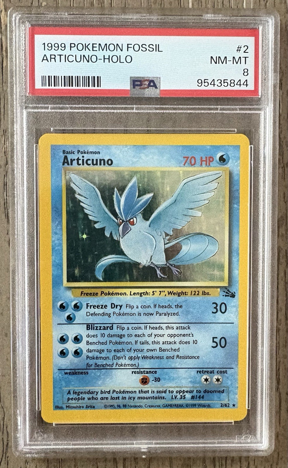 1999 POKEMON FOSSIL #2/62 ARTICUNO HOLO RARE PSA 8