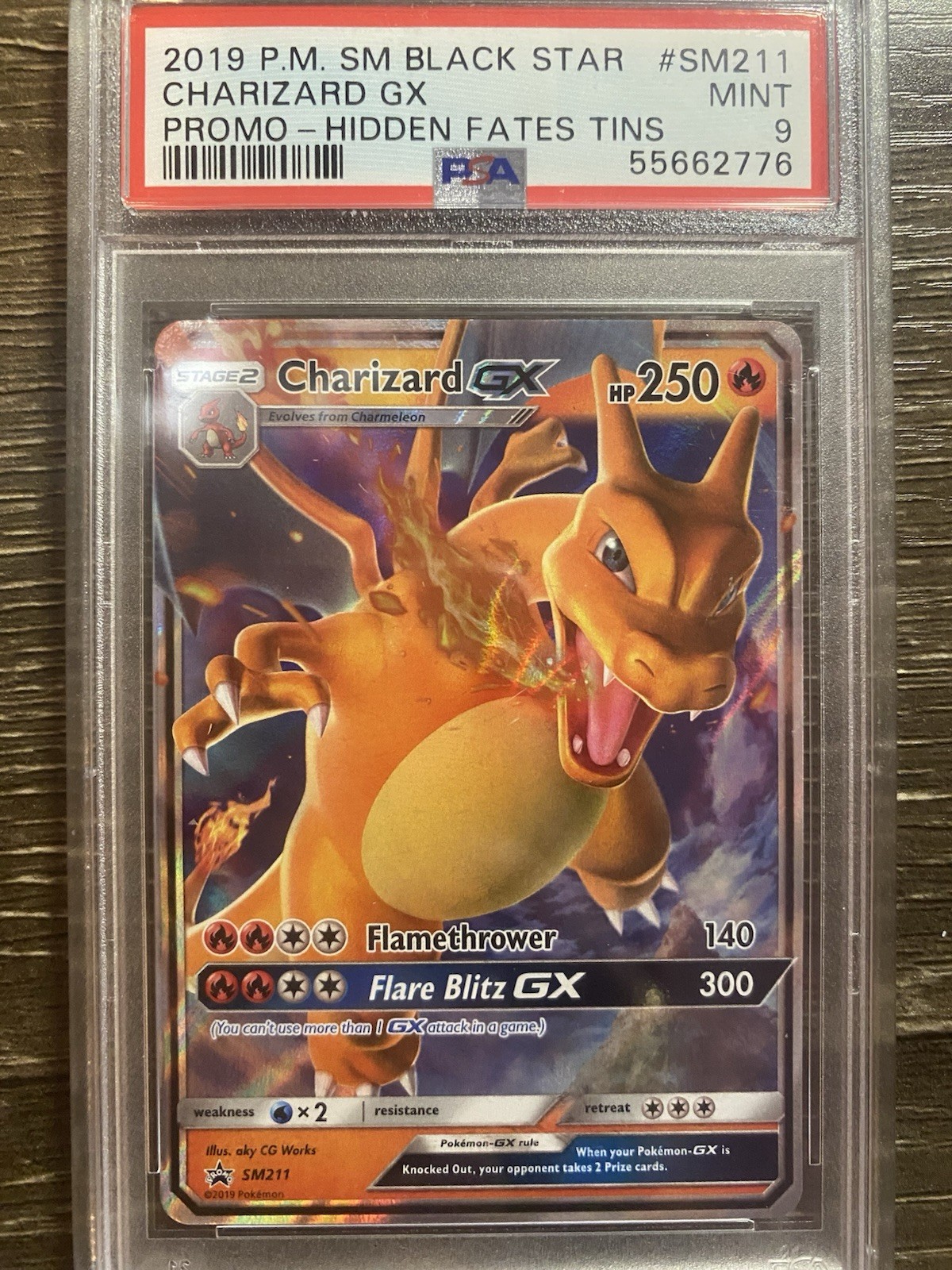 Charizard GX – (SM Black Star Promo) SM211 Jumbo Cards Holo PSA 9🔥