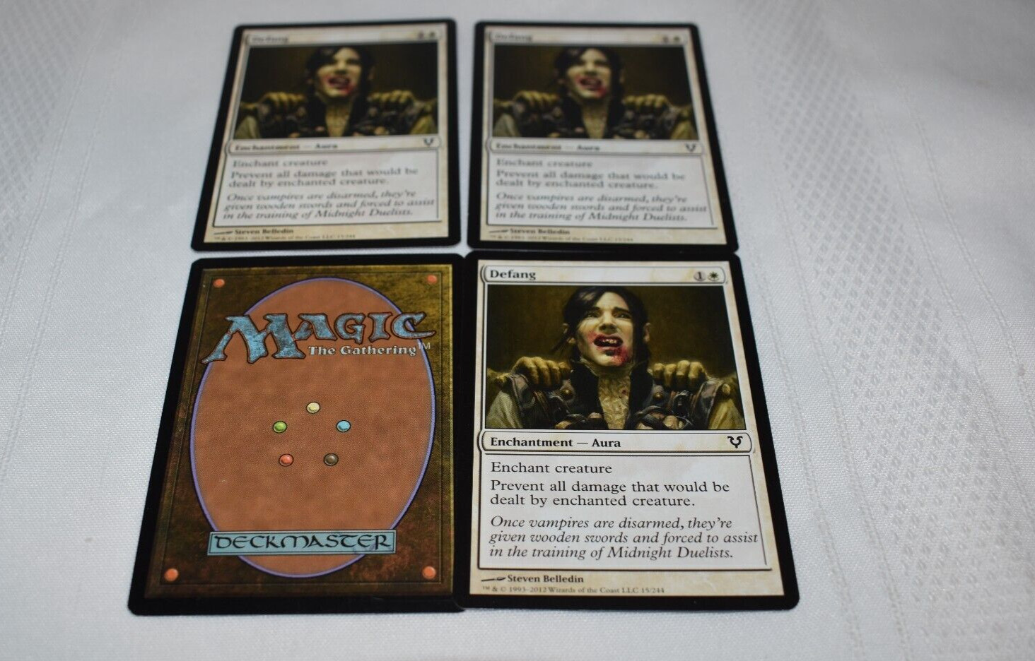Magic card: 4x Defang White Common Enchantment Aura 2012 Steven Belledin
