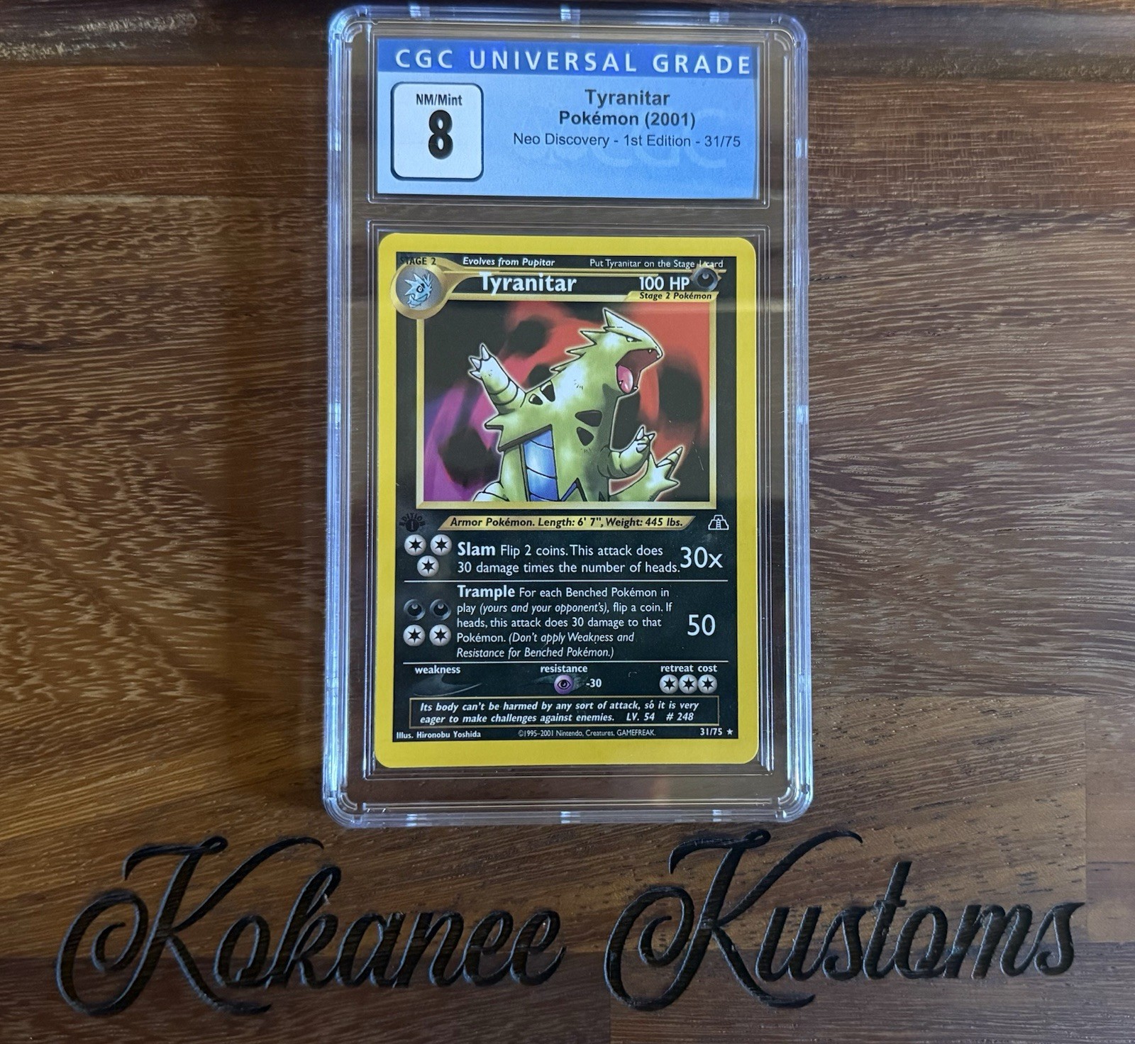 Tyranitar Neo Discovery – 1st Edition – 31/75 – CGC 8