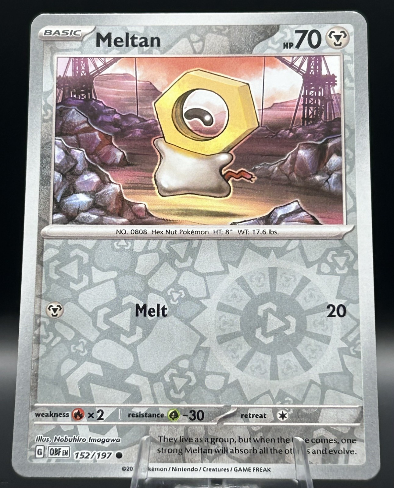 Meltan 152/197 Pokemon Obsidian Flames SV03 Reverse Holo Common Card Near Mint