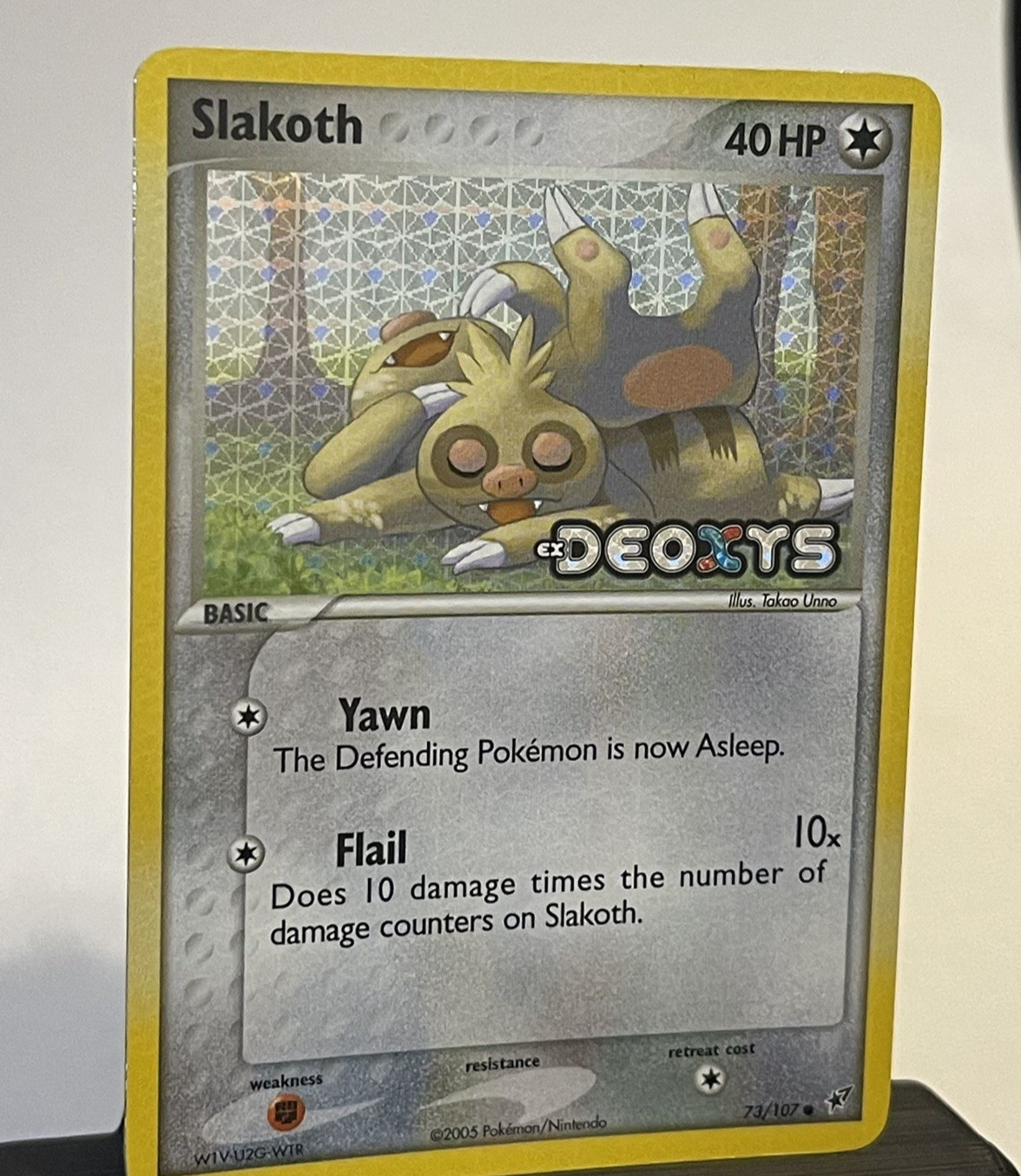 Pokemon TCG – Slakoth EX Deoxys Reverse Holo 73/107 NM (Edge Holobleed)