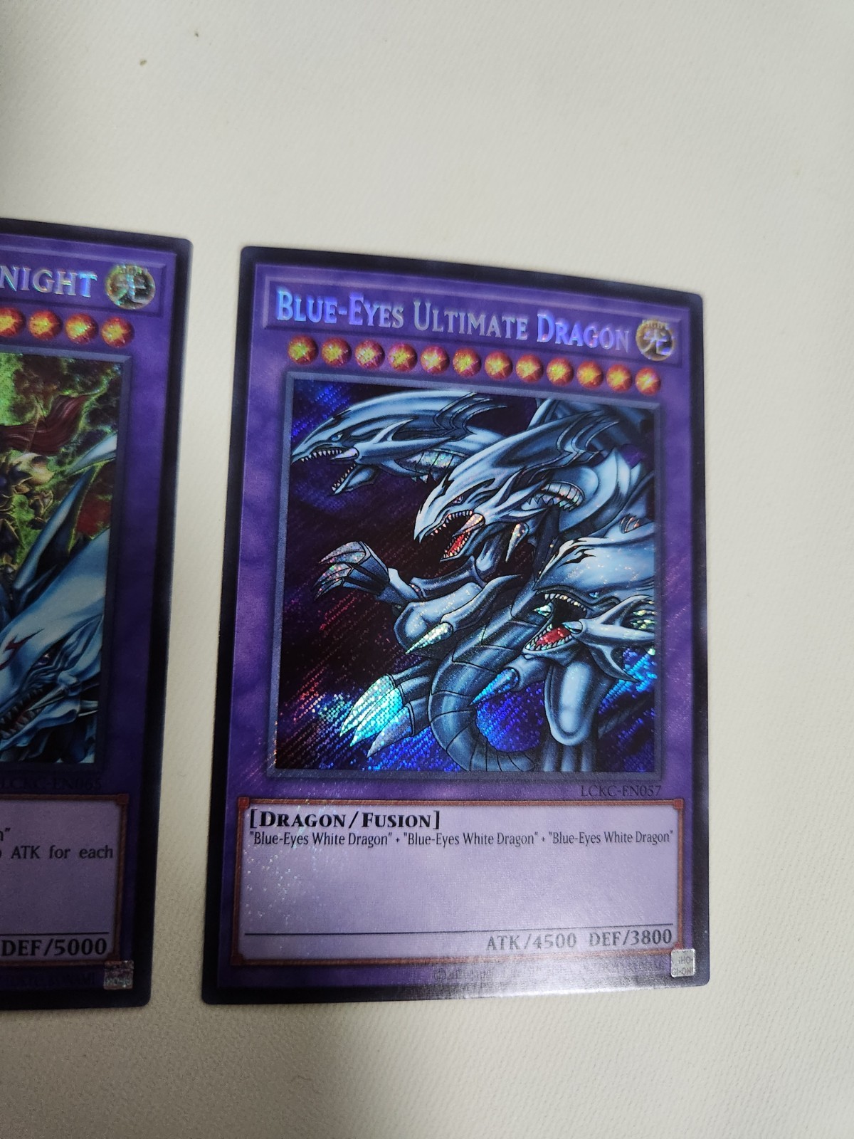 Yugioh 2x Set/ Dragon Master Knight + Ultimate Dragon/ Secret Rares LCKC NM/MINT