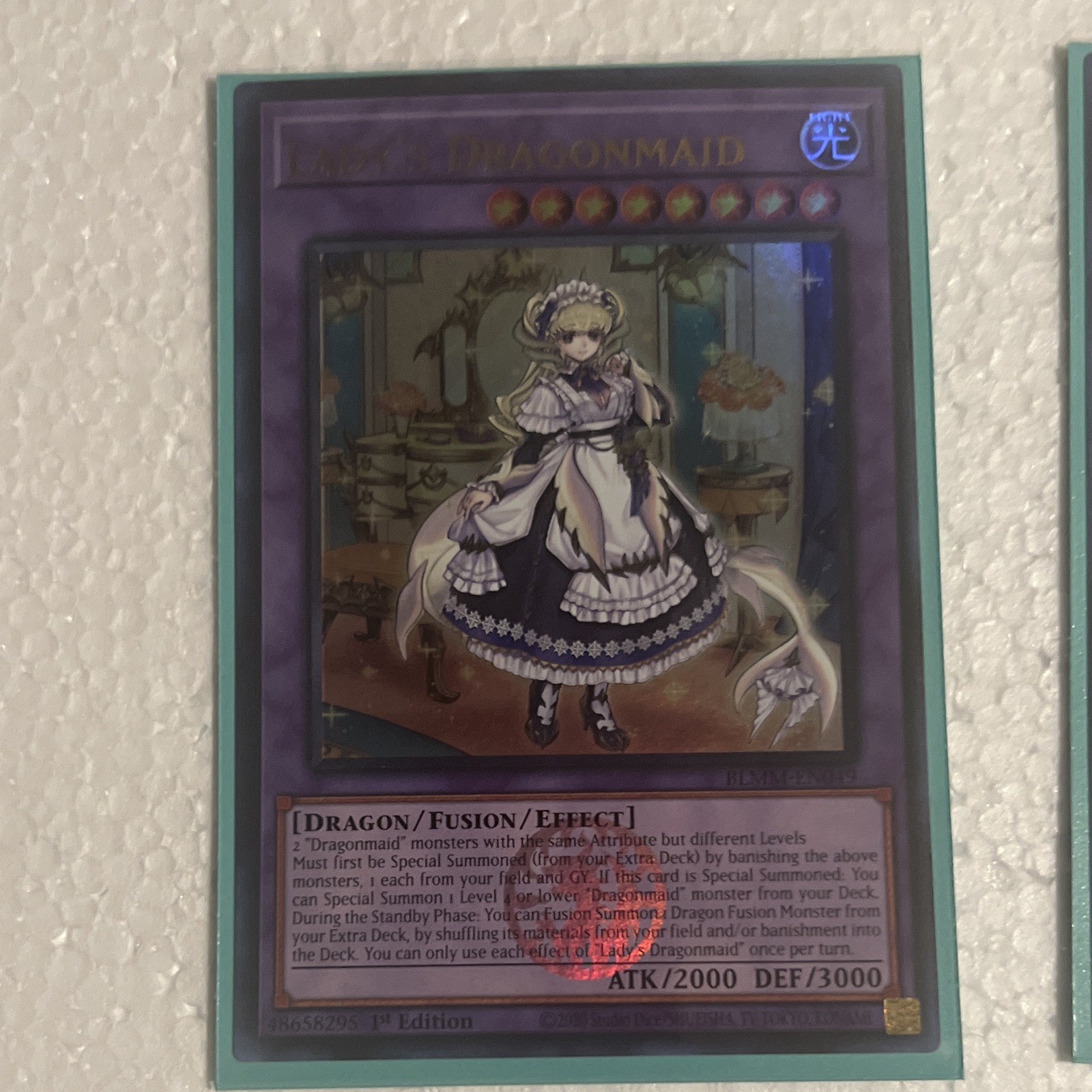 Yu-Gi-Oh! TCG Lady’s Dragonmaid 1st Edition Ultra Rare Card BLMM-EN049