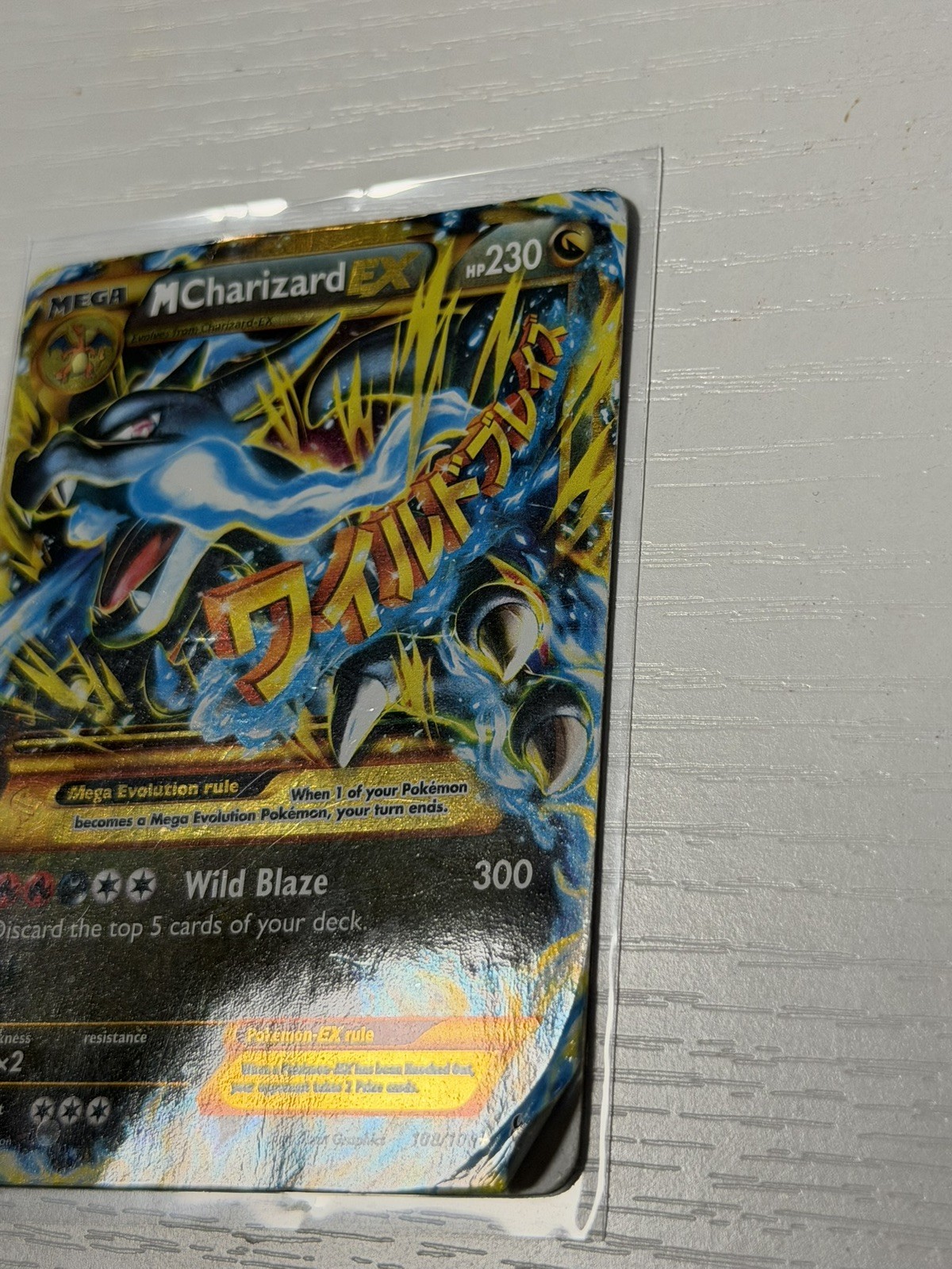 M Charizard EX (X) (Secret Rare) 108/106 Flashfire Holo – Damaged – Authentic
