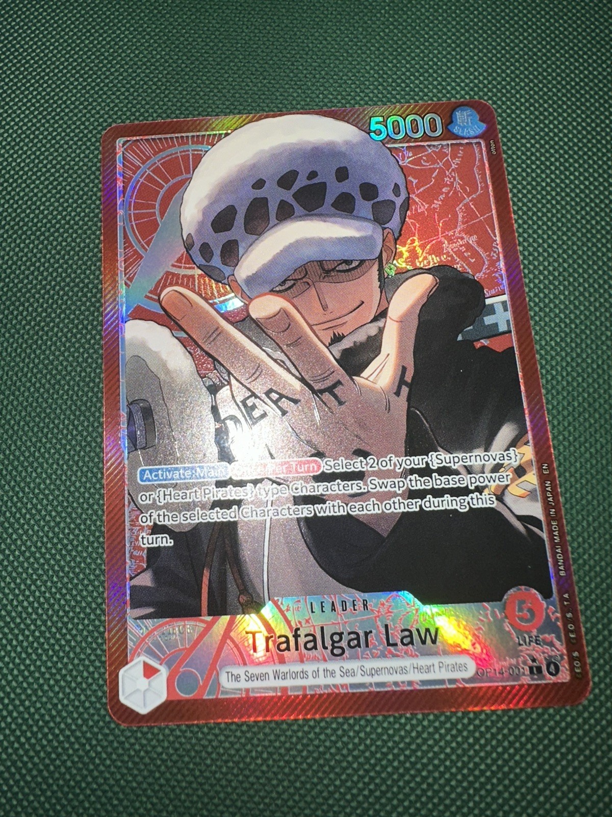 Trafalgar Law – OP14-001 (Alternate Art) OP14-001 The Azure Sea’s Seven Foil