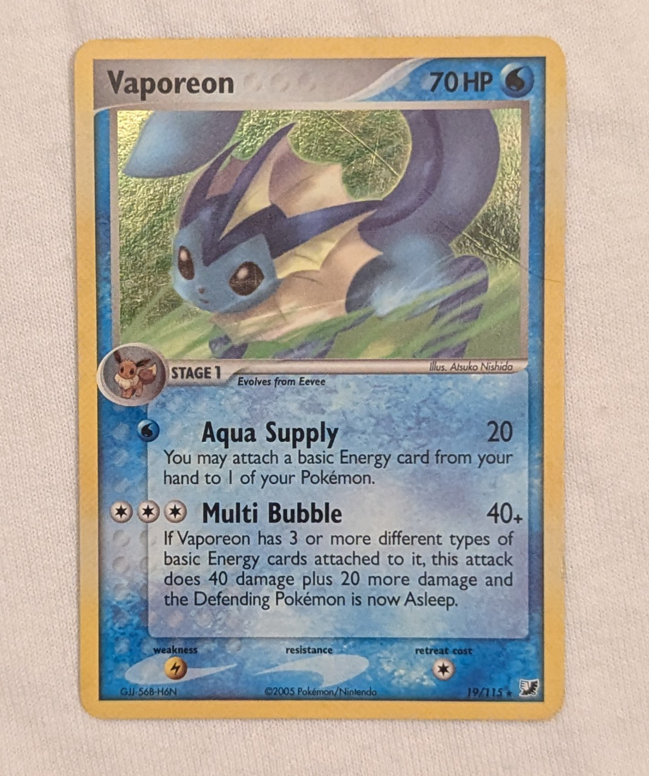 Vaporeon 19/115 Unseen Forces Holo HP/DMG