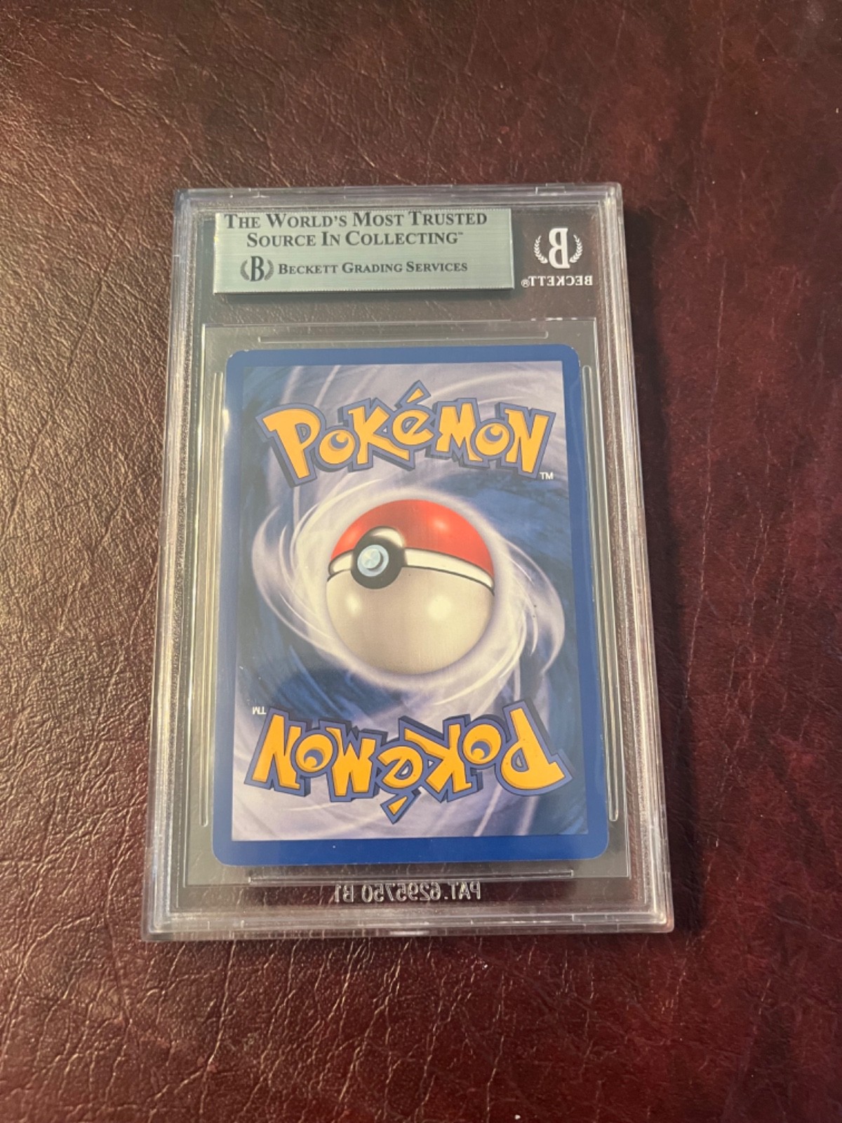Alakazam Pokemon (2002) Expedition – 33/165 Beckett 8.5 NM-MT+